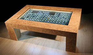 Illustration for article titled Periodic Coffee Table With Embedded Element Samples